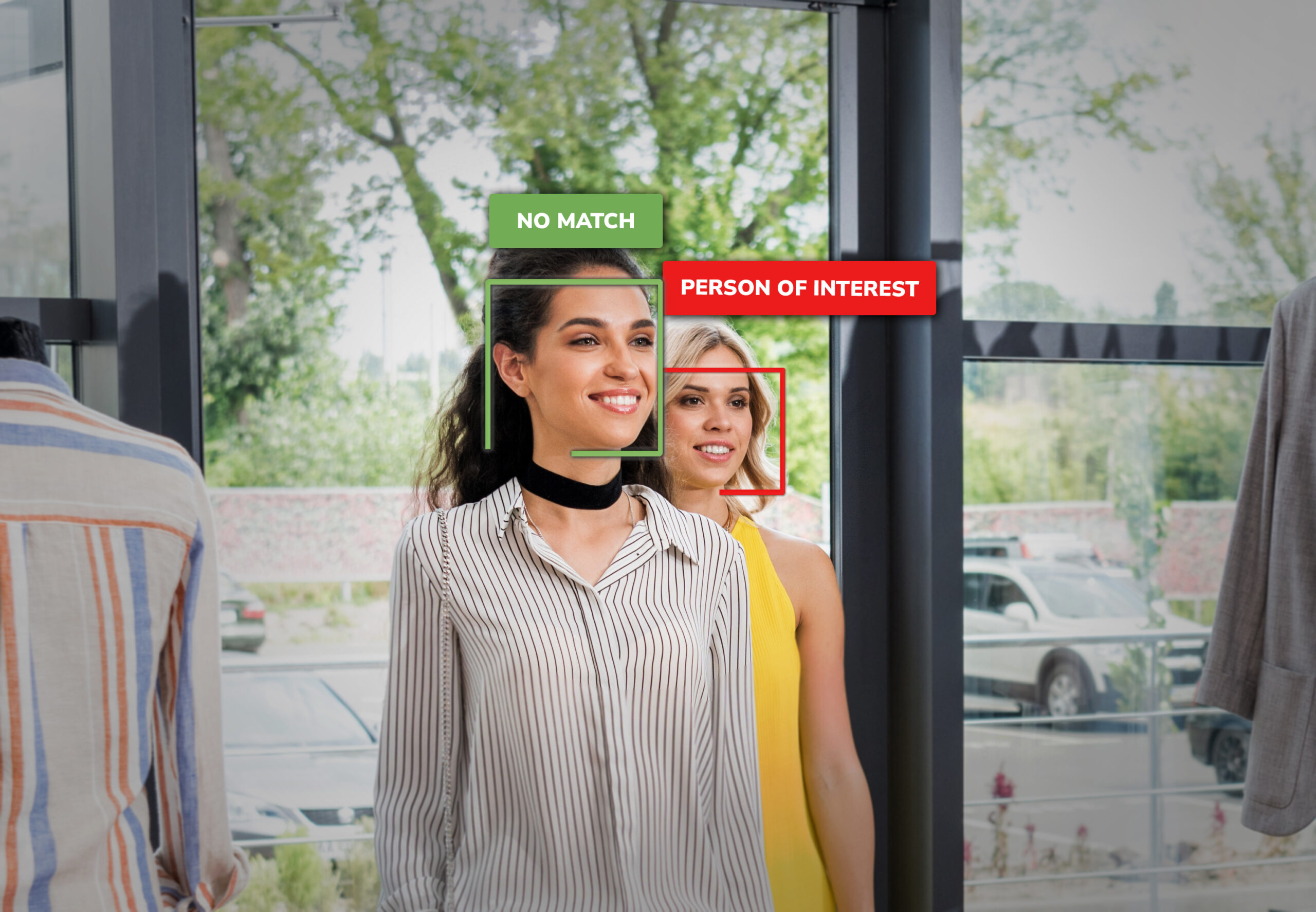 10845NB_SAFR GUARD Retail Entrance Image_V2 Two women walking into a retail store