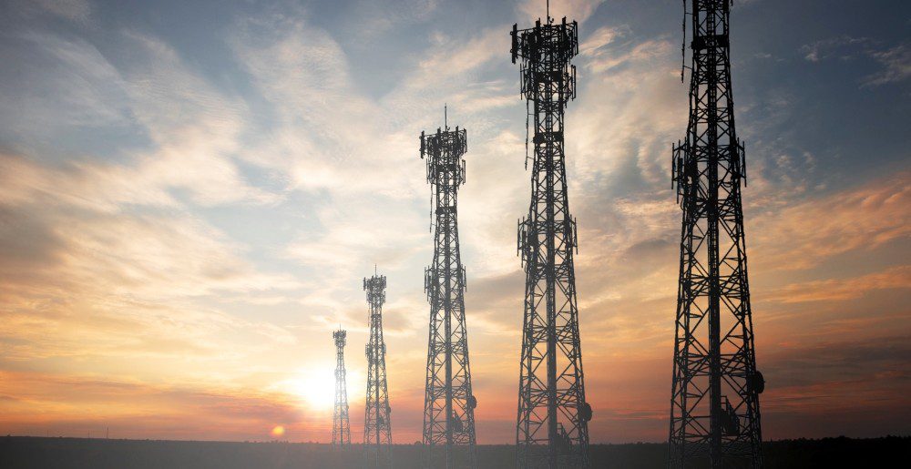 Cell towers with sunset 1000×515 Cell towers with sunset in distance