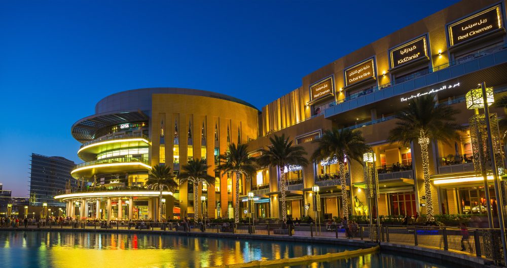 Dubai mall at night 1000×530 Bank sign on building
