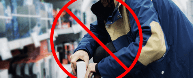 Man stealing from a retail store. Image has prohibited symbol overlaid.