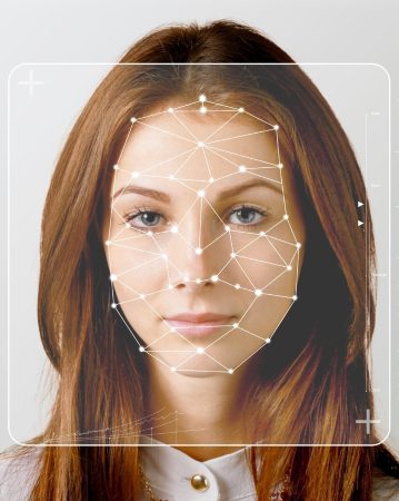 facial-recognition-red-hair-woman-359×450-1(1) Woman with facial recognition diagram over her face